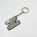 Detailed close-up of crystal letter N keychain with colorful rhinestones and silver metal ring - Letter N