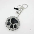 Porte-clés patte d'ours en strass brillant avec pompon noir et clochette argentée - Noir