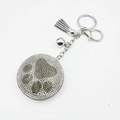 Porte-clés patte d'ours en strass avec pompon gris et pendentif cloche en métal argent - Gris clair