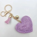 Purple heart keychain with sparkling crystals, pink tassel, and gold-tone metal hardware - Gold Tone + Violet