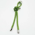 Detail of green rhinestone knotted keychain with silver spring clasp and heart pendant - Light Green