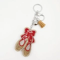 Portachiavi scarpette da ballo con strass rossi e oro e nappina in pelle scamosciata - Colore cachi scuro