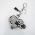 Sparkling crystal heart keychain with rhinestone paw print and black leather tassel charm - White