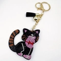Macro detail of cat keychain with black crystals, golden lobster clasp and black tassel - Black 2