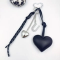 Detail of heart PU leather keychain with rhinestone letter U and polka dot woven strap - Letter U