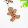 Gingerbread man keychain with brown tassels and sparkling rhinestones on white background - Gold/Brown