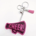 Detailed view of pink rhinestone megaphone keychain with CHEER text and leather tassel - Rose Red