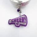 Detail of purple rhinestone megaphone keychain with silver CHEER text and silk tassel - Dark Violet