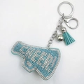 Close-up of sky blue rhinestone megaphone keychain with silver CHEER lettering and tassels - White with Lake Blue