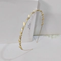 Elegante diadema de hojas doradas con piedras ojo de gato y brillantes pedrería - Dorado