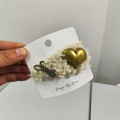 Detail of plush cream faux fur headband with a gold heart and Smile crystal lettering - Hair Clip / Off White