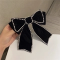 Detailed close-up of black velvet bow hair clip with luxury rhinestone chain edges - Style G Black