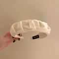 Minimalist creamy beige satin headband featuring elegant wide pleated ruched texture - White