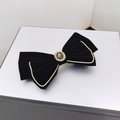 Dettaglio del fiocco per capelli in velluto nero con strass ovale e bordi in cristallo - Stile con Gemma Ovale (Nero)