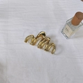 Elegant gold metal wave hair claw clip for thick hair with high-shine liquid metal finish - Gold