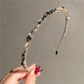 Cerchietto sottile argento con strass grigio fumo e iridescenti su base metallica - Grigio