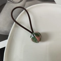 Minimalist elastic hair tie with marble texture resin bead in green and pink hues - Pink and Green