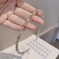 Diadema fina de metal elegante con cuentas de cristal champán para un estilo retro - Champán
