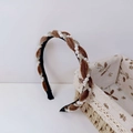 Detail of twisted brown velvet headband with sparkling crystals and white faux pearls - Tortoise