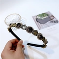 French vintage headband with black gemstones and decorative clock dials on white background - Crystal Style