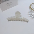 Detail view of large pearl white acetate hair claw clip with shimmering mermaid finish - 11cm / Straight Line Cross