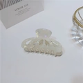 Close-up of cream white hollow petal hair claw clip with pearlescent acetate texture - 8cm / Watermelon Style