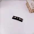 Detail of vintage black fabric hair clip with faux pearls and brown rhinestones - Type C BB Clip