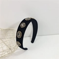 Serre-tête baroque en velours noir orné de strass vintage et détails dorés luxueux - Style Cristal Gris