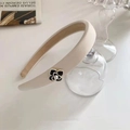 Beige padded headband with black and white camellia flower and pearl detail - White