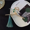 Gold hair claw clip with white flower, pearl pendant, and long light green silk tassel - Style A Tassel