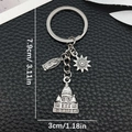 Porte-clés en argent antique avec Marie, roue solaire et breloques de château - Style Château Soleil Argent Antique (ER1881)