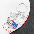 Silver USA flag map keychain with globe airplane and star charms for travel gifts - Rhinestone USA Map Plane Globe Style (ER1655)