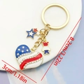 Golden American flag heart keychain with glittering bear and stars charms, 8.2cm length - Rhinestone Heart Flag (ER1660)