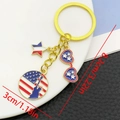 Portachiavi USA dorato 4 luglio con Liberty e ciondoli stella, lunghezza 8,2 cm - Stile Libertà e Occhiali (ER1668)