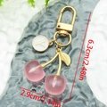 Detail showing pink cherry keychain size measurements with golden Y letter charm - White Letter Y (ER1594)