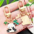 Cute panda and bamboo metal keychain charms with gold-plated spring D-ring clasp - Dazed Panda Style (ER1135)