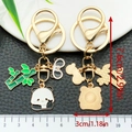 Chinese panda and bamboo keychain with enamel finish and gold-tone metal hooks - Peace Sign Panda Style (ER1206)