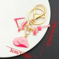 Pink western cowboy keychain set with hat and boots charms on gold keyring - Pink Cowboy Hat Gun (ER1257)