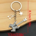 Porte-clés créatif en métal avec guitare, note de musique et étoile, longueur totale 8,1 cm - Style Guitare Noir Gris Argent Antique (ER1443)