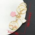 Detail view of pink cherry blossom rabbit keychain with dimensions 8.4cm and 3.30in - Cherry Blossom Bunny (ER1730)