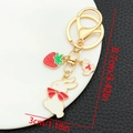 Detailed dimensions of cartoon rabbit strawberry keychain showing 8.7cm length and 3cm width - Strawberry Bow Rabbit Keychain (ER1725)