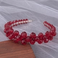 Handmade bridal headband featuring sparkling red crystal beads on a thin silver frame - Red