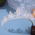 Detail of silver bridal tiara featuring teardrop crystals and floral metal frame - Silver Handmade Style