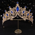 Luxurious gold bridal crown with deep blue marquise gemstones and white crystals - Gold Base Blue Stone