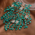 Exquisite bridal headband with emerald green rhinestones and gold leaf branch design - Green
