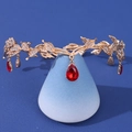 Elegant gold bridal crown featuring white rhinestones and large red teardrop gemstones - Noble Leaf Red Teardrop Style (015)