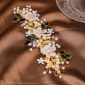 Elegant gold bridal hair comb with white resin flowers, pearls and black gems on satin - Black