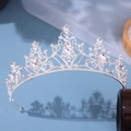 Elegant silver bridal tiara with intricate filigree patterns and pear-shaped crystals - Silver / White Zirconia