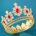 Golden bridal crown with red oval gemstones and white crystals on blue background - European Iris Red Oval Style (099)