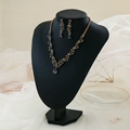 Baroque style gold jewelry set with grey teardrop stones and matching earrings - Black & Gold